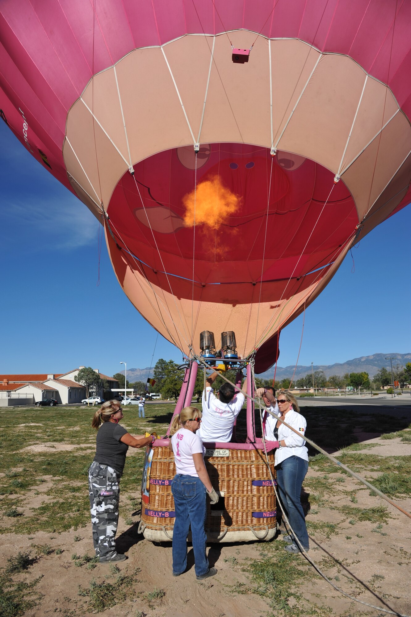 Nelly-B, a balloon piloted by a crew from Belgium, makes a stop at Kirtland's Child Development Center Oct. 7 to allow the children an up-close view. Nelly-B and its team is here for the Albuquerque International Balloon Fiesta.  (Photo by Ken Moore)