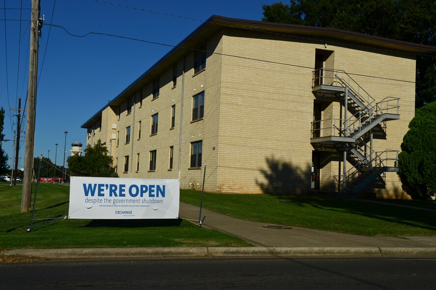 A sign shows the Exchange is open during the shutdown on Barksdale Air Force Base, La., Oct. 7, 2013. The Exchange is run by non-appropriated funds allowing the establishment to remain open to serve its customers despite the government shut down. (U.S. Air Force photo/Senior Airman Micaiah Anthony)