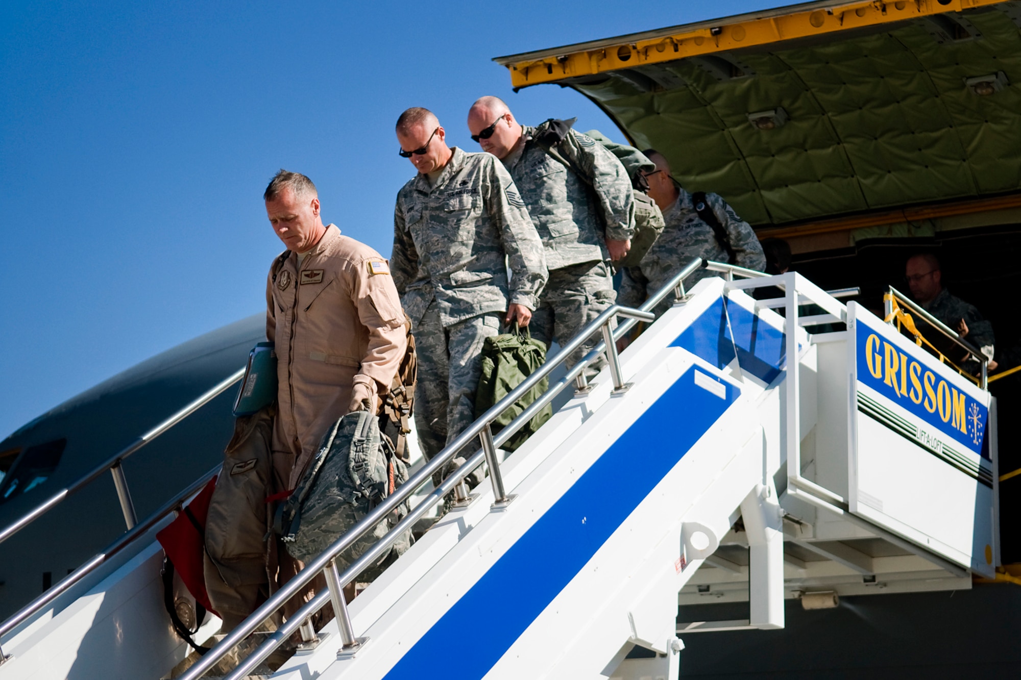 434th Air Refueling Wing Airmen deplane a KC-135R Stratotanker after returning to Grissom Air Reserve Base, Ind., from a deployment to Southwest Asia Sept. 22, 2013. More than 60 Airman deployed from the 434th Air Refueling Wing. (U.S. Air Force photo/Tech. Sgt. Mark R. W. Orders-Woempner)
