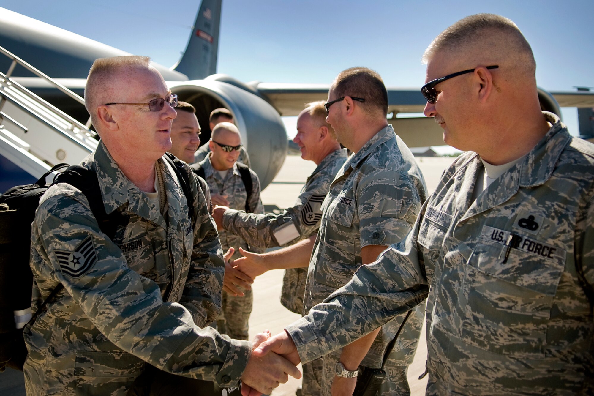 Tech. Sgt. Kevin Hutchison, 434th Maintenance Squadron aircraft hydraulic mechanic, is greeted by Senior Master Sgt. Christopher Zorn, 434th Aircraft Maintenance Squadron production Supervisor, as he returns to Grissom Air Reserve Base, Ind., from a deployment to Southwest Asia Sept. 22, 2013. Hutchison returned to Grissom with more than 60 other Airman who deployed from the 434th Air Refueling Wing. (U.S. Air Force photo/Tech. Sgt. Mark R. W. Orders-Woempner)
