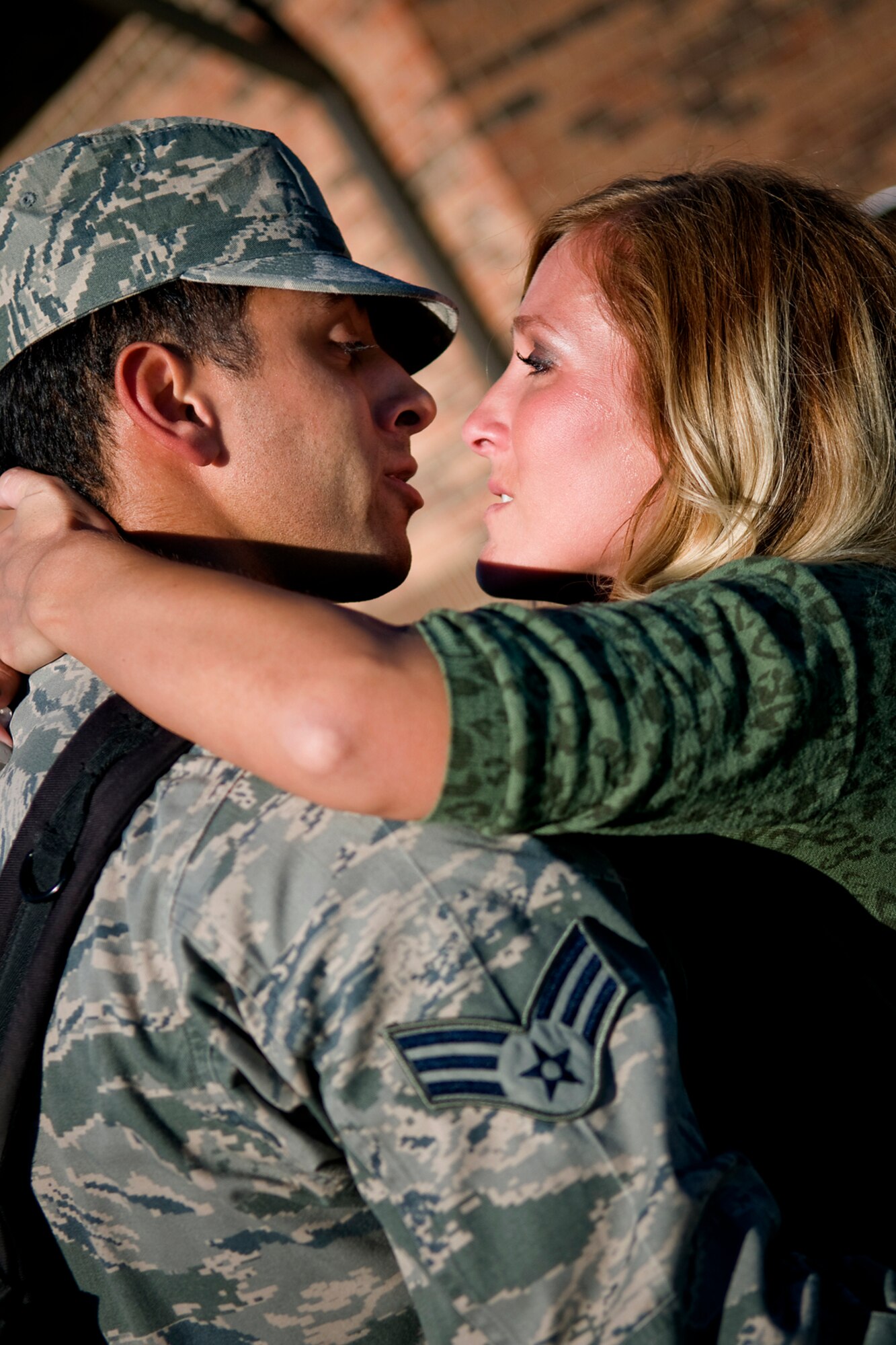 Senior Airman Anthony Krock, 434th Aircraft Maintenance Sqaudron KC-135 crew chief, is welcomed home from a deployment to Southwest Asia by his girlfriend, Andrea Dailey, at Grissom Air Reserve Base, Ind., Sept. 22, 2013. Krock returned to Grissom with more than 60 other Airman who deployed from the 434th Air Refueling Wing. (U.S. Air Force photo/Tech. Sgt. Mark R. W. Orders-Woempner)
