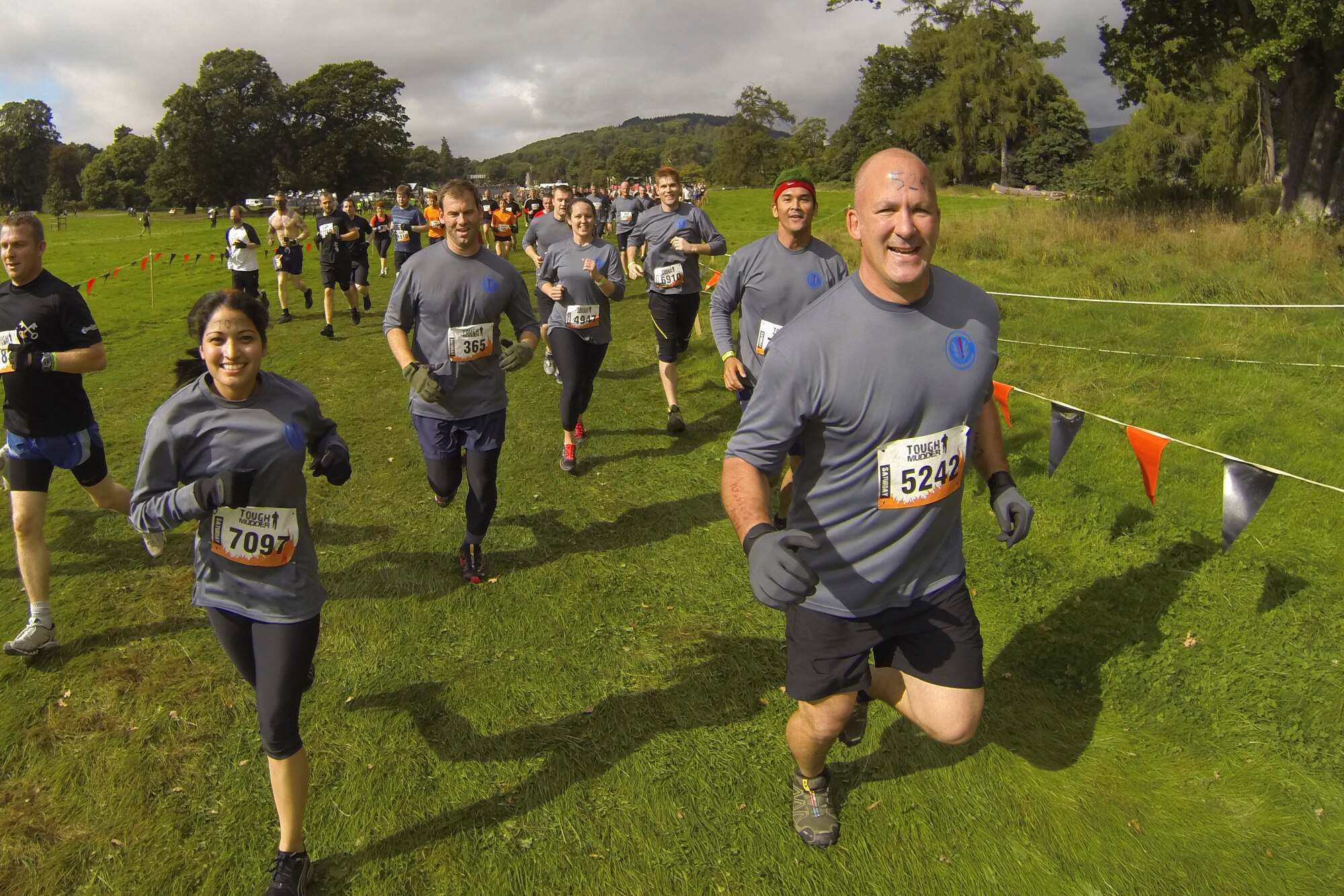 Members of the 352nd Special Operations Group run during the Tough Mudder U.K. Southwest 2013 event Sept. 21, 2013, at Crickhowell, Wales. All members of the “352 SOG Tough Mudders” team completed the 11-mile obstacle course, which according to Tough Mudder’s website, is “designed to test ones strength, stamina, determination and camaraderie.” (U.S. Air Force photo by Staff Sgt. Stephen Linch)