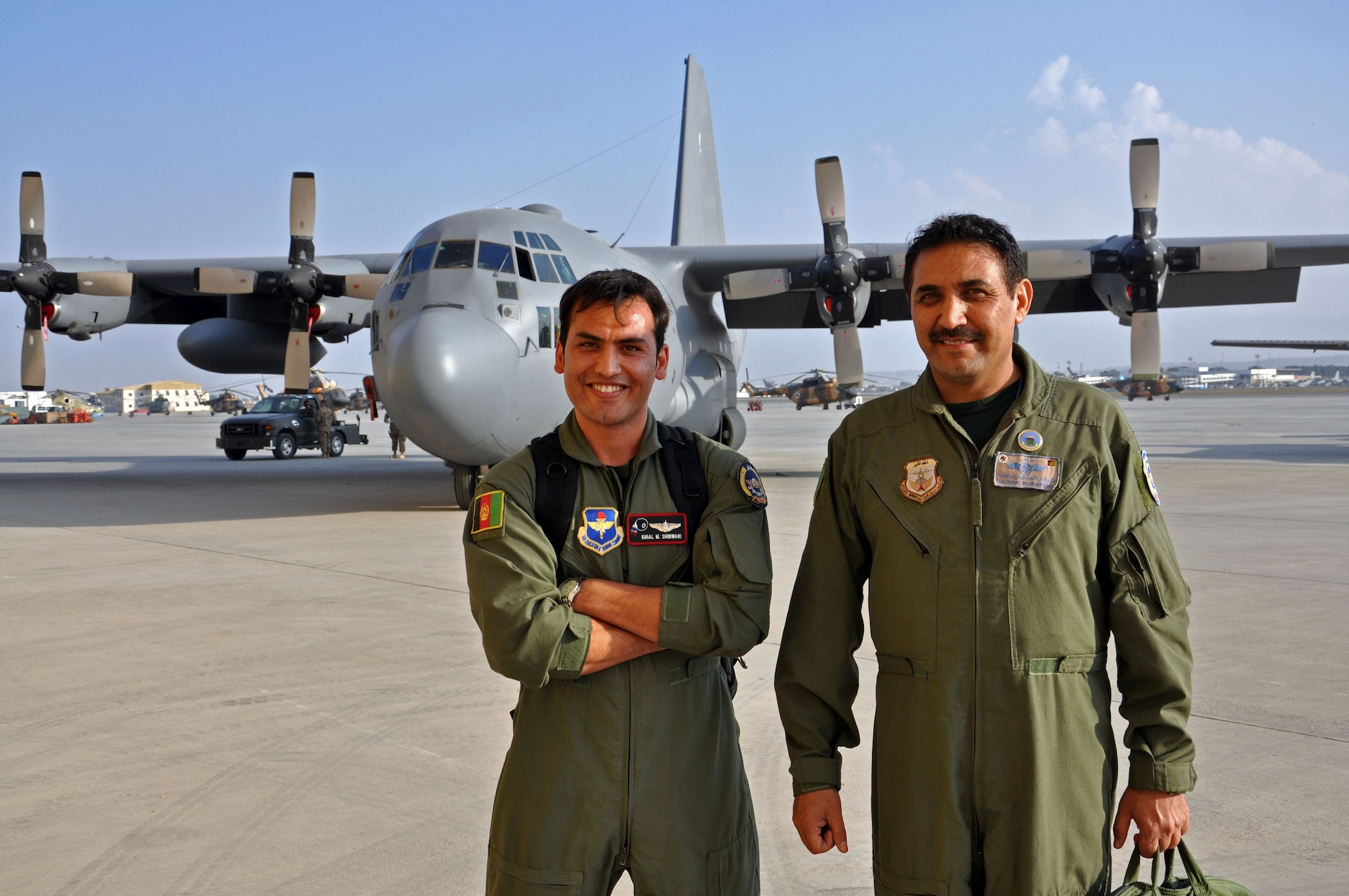Afghan Air Force pilots 1st Lt. Khial Shinwari (left) and Col. Almal Pacha (right) are the first two C-130 pilots in the AAF. They attended training at Little Rock Air Force Base, Ark., and returned to Afghanistan at the beginning of October. Shinwari and Pacha will continue training in Afghanistan with advisors from NATO Air Training Command-Afghanistan. (U.S. Air Force photo/Capt. Anastasia Wasem)
