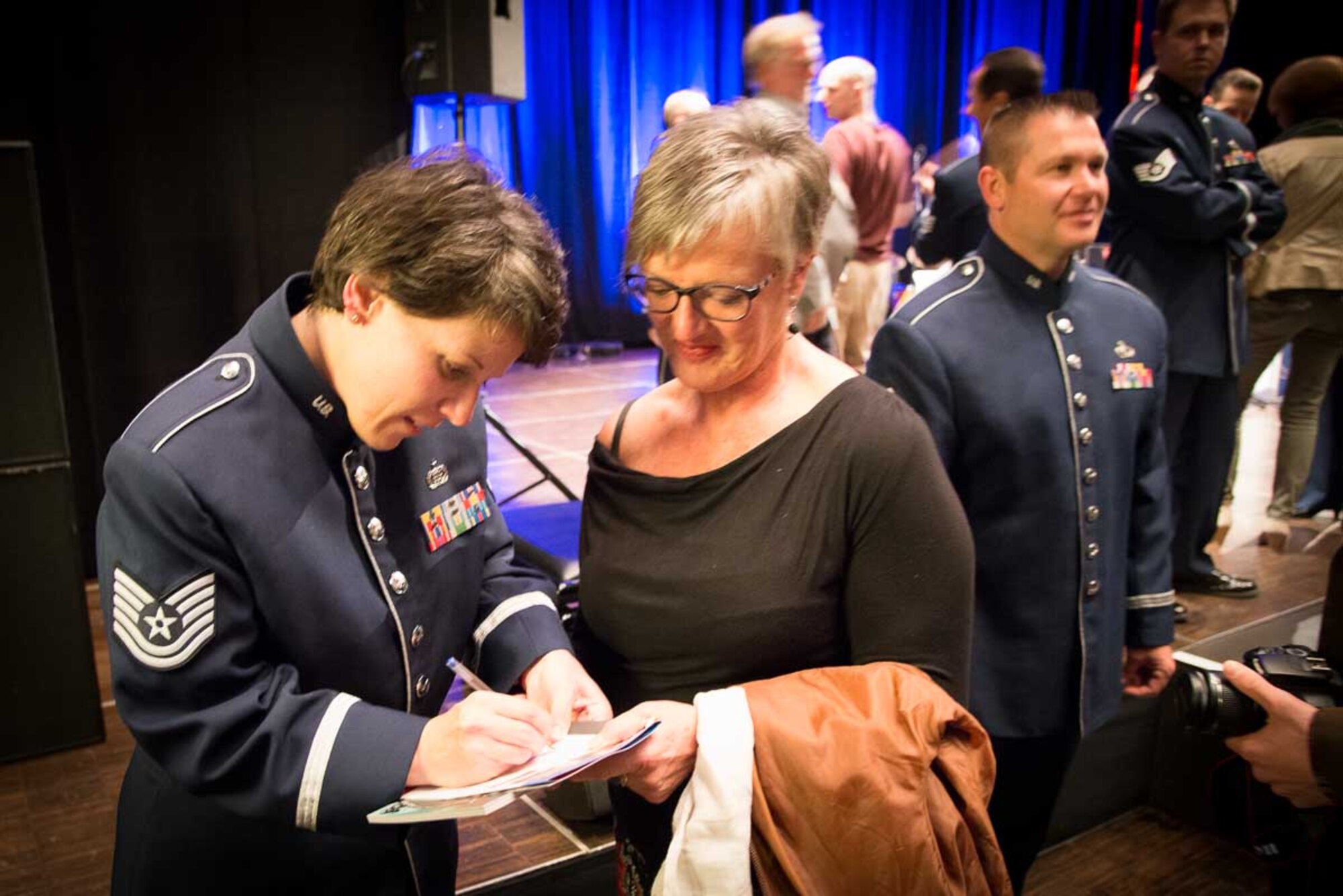 TSgt Saundra Sininger signs autographs after Wings of Dixie's performance at the Enternach Urban Jazz Festival in Enternach, Luxembourg.  The festival was sponsored by the U.S. Embassy in Luxembourg and the Enternach Tourist Office.