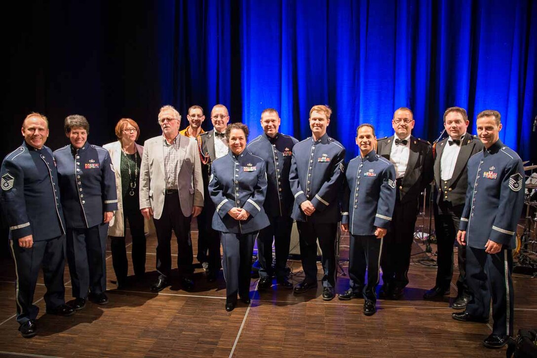 THe USAFE Band Wings of Dixie perform for the Urban Jazz Festival in Enternach, Luxembourg.  Wings of Dixie performed opposite the Luxembourg Army Dixieland Band,  (From left to right event sponsors, and members of the Luxembourg Army Band).