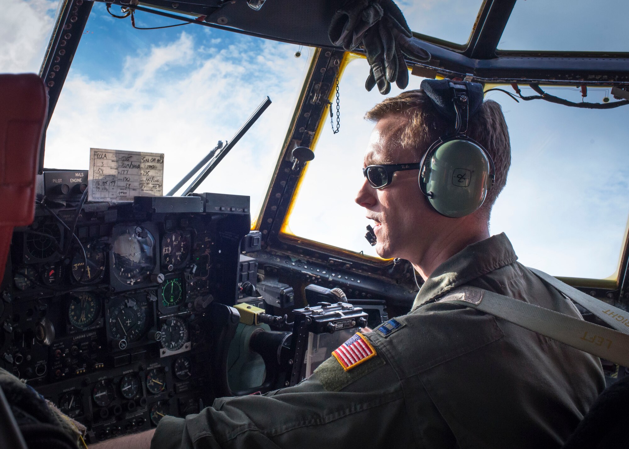 Capt. Mike Kelly, 36th Airlift Squadron co-pilot, flies a C-130 Hercules during a training mission as part of Readiness Week at Yokota Air Base, Japan, Oct. 8, 2013. Yokota’s airlifters provide rapid tactical airlift support throughout the pacific theater. (U.S. Air Force photo by Captain Raymond Geoffroy/Released)