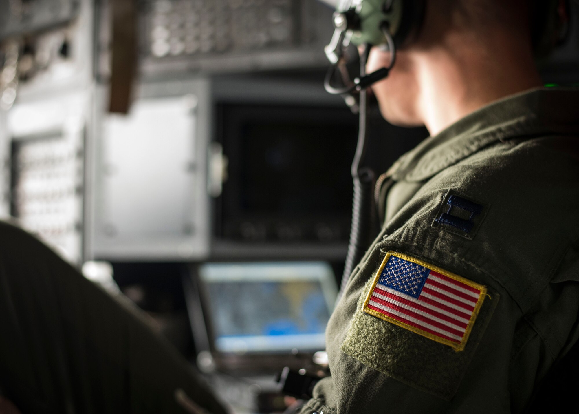 Capt. Richard Culver, 36th Airlift Squadron navigator, reviews his flight path during a training mission as part of Readiness Week at Yokota Air Base, Japan, Oct. 8, 2013. Readiness week is focused on a number of mission related tasks that enhance the wing’s ability to perform its mission under various conditions. (U.S. Air Force photo by Captain Raymond Geoffroy/Released)