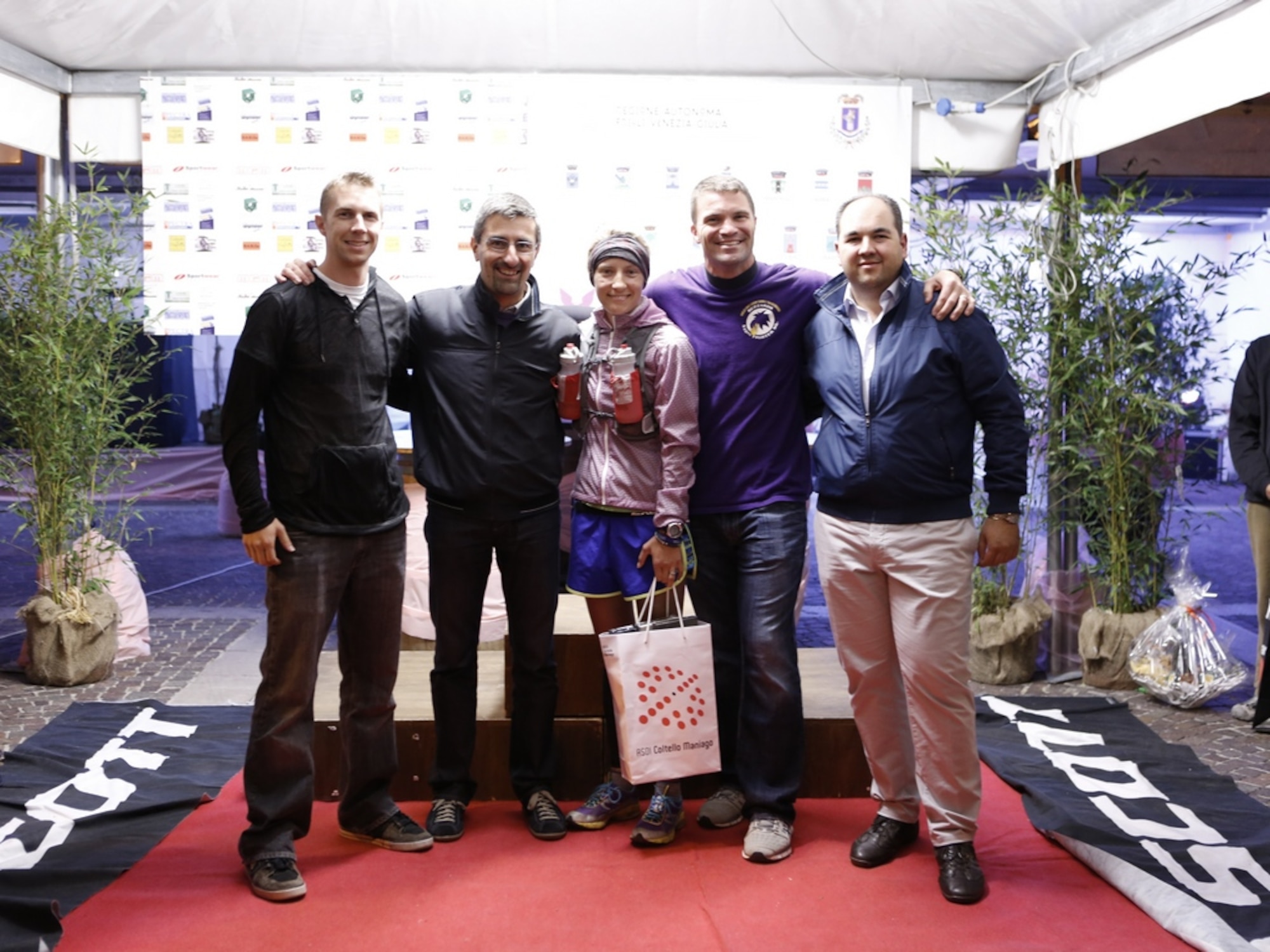 Dr. Andrea Carli, Mayor of Maniago, poses with members of the fighter
squadrons Oct. 6, 2013, at Vivaro, Italy, following a short memorial service for
Major Lucas 'Gaza' Gruenther. Approximately 120 runners participated in the
3rd-annual Magredi 100-mile Ultra Trail Run held in Vivaro Oct. 5-7.
(Courtesy Photo)
