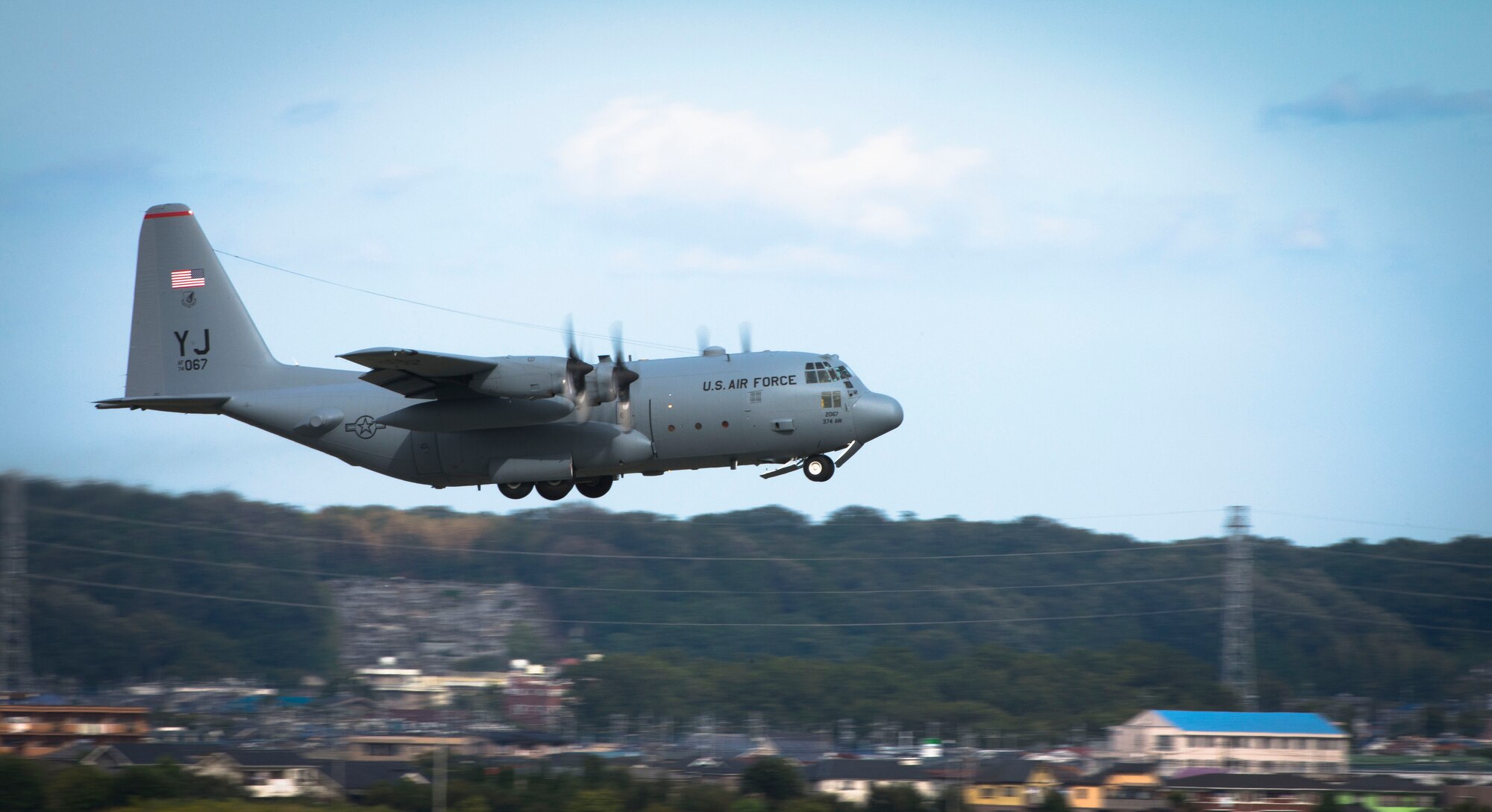 A C-130 Hercules takes off from Yokota Air Base, Japan, Oct. 9, 2013 during readiness week. Readiness week is five days of training designed to improve Yokota's contingency capabilities. (U.S. Air Force photo by Staff Sgt. Chad C. Strohmeyer/Released)