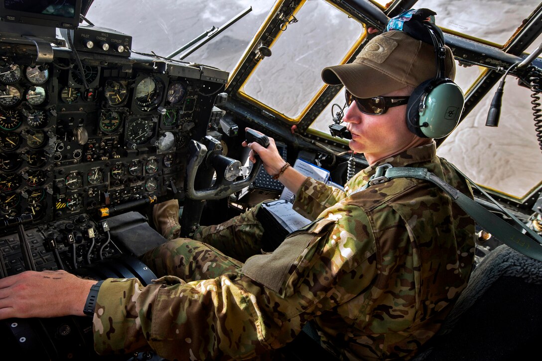 U.S. Air Force 1st Lt. Brent Stevens flies a C-130 Hercules aircraft to Forward Operating Base Sharana in Paktika province, Afghanistan, Sept. 28, 2013. Stevens, a pilot, is assigned to the 774th Expeditionary Airlift Squadron. The unit's airmen transported the last cargo from Sharana before command of the base was transferred to the Afghan Ministry of Defense.