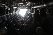 Marines from 2nd Force Reconnaissance Battalion prepare to jump out of an MV-22B Osprey as part of their parachute operations, Sept. 26. The operation was being conducted as training for the jumpers and acted at practical application for the pilots and crew chiefs.
