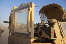 Lance Cpl. Kevin Dunseith, a Blue Point, N.Y., native and turret gunner with Combat Logistics Regiment 2, Regional Command (Southwest), mans his machine gun during a combat logistics patrol in Helmand province, Afghanistan, Sept. 29, 2013. Dunseith stood in the turret for hours watching for possible threats during a four-day mission to Camp Dwyer, Afghanistan.