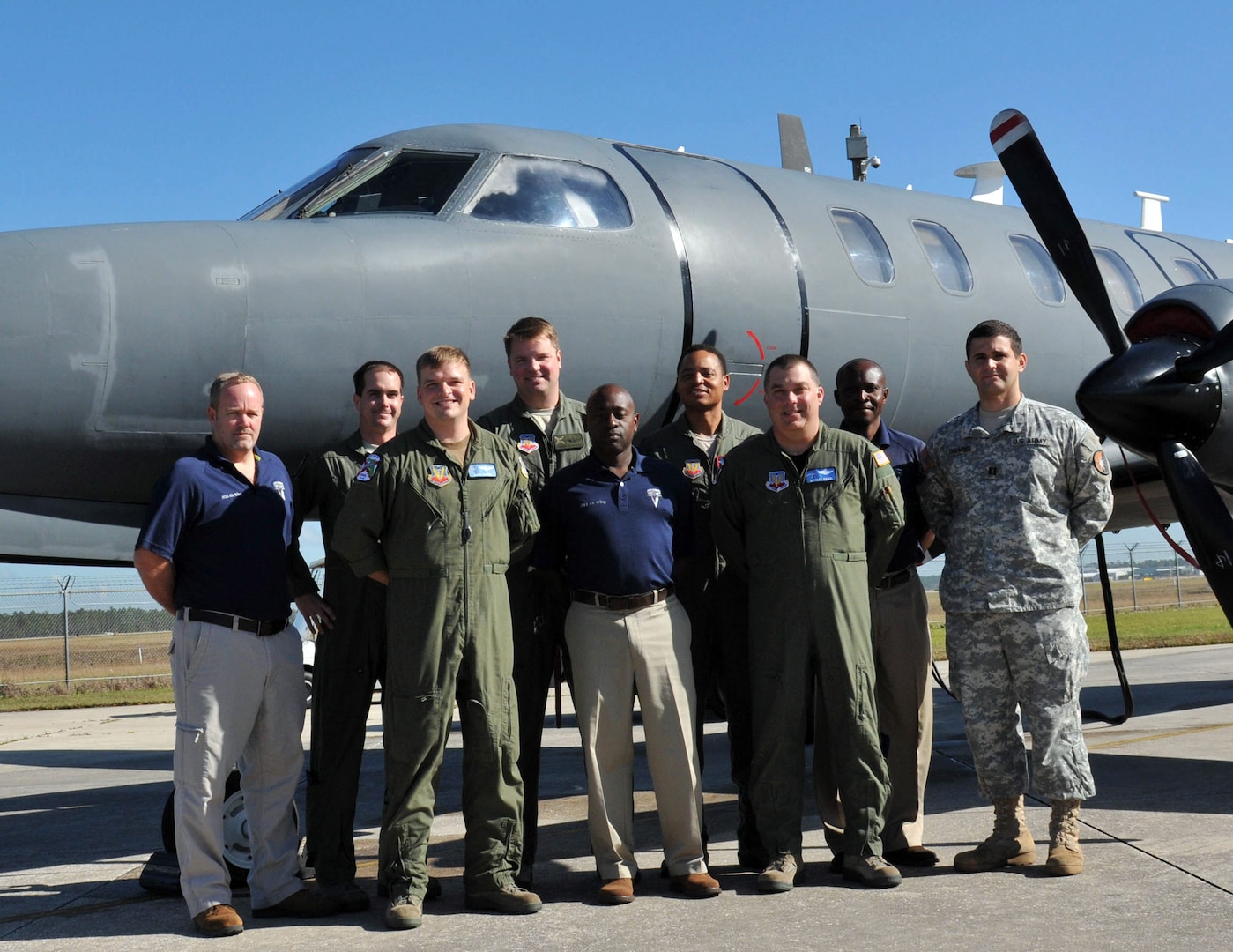 Members of the Florida Air National Guard's 125th Fighter Wing pose with visitors from the Eastern Caribbean during a State Partnership Program exchange concerning the RC-26 aircraft, in December 2011 in Jacksonville, Fla. Florida's SPP will continue to engage Caribbean nations throughout 2012, giving National Guard members an opportunity to share valuable experiences and learn from other countries, while strengthening U.S. partnerships abroad.