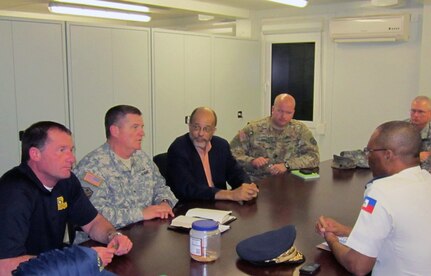 Army Brig. Gen. Glenn H. Curtis, adjutant general of the Louisiana National
Guard, and Col. Michael Edmonson, superintendant of the Louisiana State
Police, meet with Inspector General Trecile, of the Haitian National Police,
to discuss the establishment of a National Guard State Partnership Program
pairing of the LANG and the country of Haiti in Port Au Prince, Haiti, on
Jan. 18, 2012.