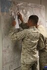 Marines with 6th Marine Regiment, 2nd Marine Division, conduct a training command post exercise Sept. 18, 2013, inside the II Marine Expeditionary Force Simulation Center aboard Marine Corps Base Camp Lejeune. "Having been in COCs (command operation centers) before in Afghanistan, it is amazing how many similarities are right [in our simulated exercise]," said Maj. Kemper Jones, the operations officer with 6th Marines, from Richmond, Va.