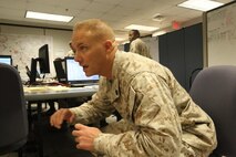 Marines with 6th Marine Regiment, 2nd Marine Division, conduct a training command post exercise Sept. 18, 2013, inside the II Marine Expeditionary Force Simulation Center aboard Marine Corps Base Camp Lejeune. "Having been in COCs (command operation centers) before in Afghanistan, it is amazing how many similarities are right [in our simulated exercise]," said Maj. Kemper Jones, the operations officer with 6th Marines, from Richmond, Va.