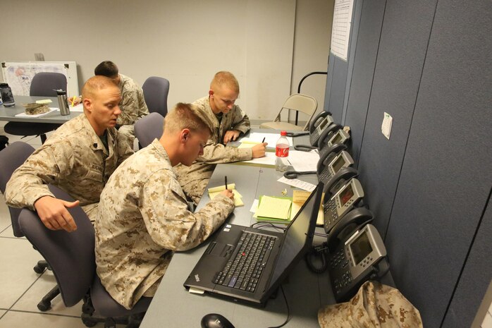 Marines with 6th Marine Regiment, 2nd Marine Division, conduct a training command post exercise Sept. 18, 2013, inside the II Marine Expeditionary Force Simulation Center aboard Marine Corps Base Camp Lejeune. "Having been in COCs (command operation centers) before in Afghanistan, it is amazing how many similarities are right [in our simulated exercise]," said Maj. Kemper Jones, the operations officer with 6th Marines, from Richmond, Va.