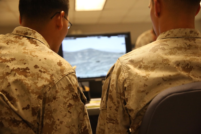 Marines with 6th Marine Regiment, 2nd Marine Division, conduct a training command post exercise Sept. 18, 2013, inside the II Marine Expeditionary Force Simulation Center aboard Marine Corps Base Camp Lejeune. "Having been in COCs (command operation centers) before in Afghanistan, it is amazing how many similarities are right [in our simulated exercise]," said Maj. Kemper Jones, the operations officer with 6th Marines, from Richmond, Va.