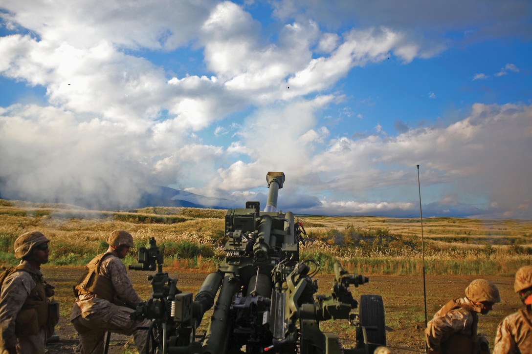 Marines with Battery F fire an M777A2 155 mm lightweight howitzer Oct. 2 at Combined Arms Training Center Camp Fuji as part of Artillery Relocation Traning Program 13-3. The ARTP was established by the governments of Japan and the U.S. in accordance with the Special Action Committee on Okinawa’s final report and is integral in ensuring combat readiness in support of the U.S.-Japan Treaty of Mutual Cooperation and Security. Battery F is with 2nd Battalion, 10th Marine Regiment, currently assigned to 3rd Bn., 12th Marines, 3rd Marine Division, III Marine Expeditionary Force, under the unit deployment program. Photo by Lance Cpl. Henry J. Antenor