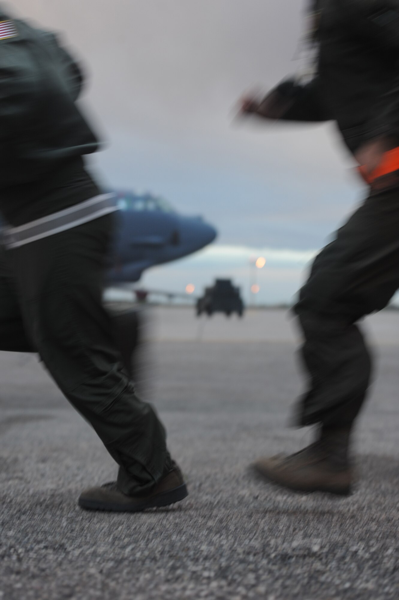 Crew members race to their B-52H Stratofortresses at Minot Air Force Base, N.D., during a training exercise, Oct. 2, 2013. Seventeen air crews joined together with aircraft maintainers to ensure combat readiness and their ability to deploy at short notice. (U.S. Air Force photo/Airman 1st Class Andrew Crawford)