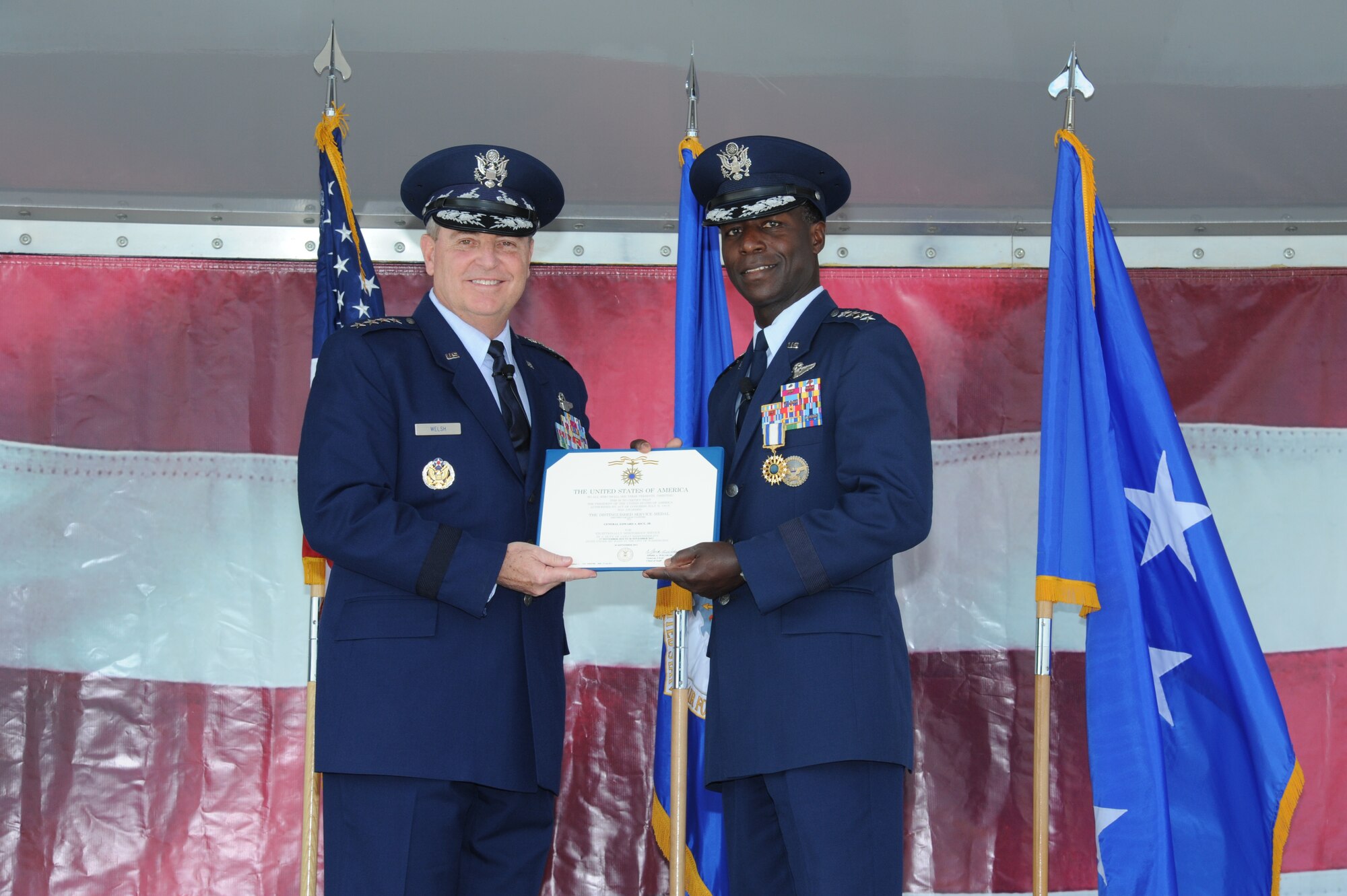 JOINT BASE SAN ANTONIO-RANDOLPH, Texas -- (Right) Gen. Edward A. Rice Jr., former Air Education and Training Command commander, received the Distinguished Service Medal from Air Force Chief of Staff Gen. Mark A. Welsh III, during his retirement ceremony here Oct. 10. (U.S. Air Force photo by Rich McFadden)