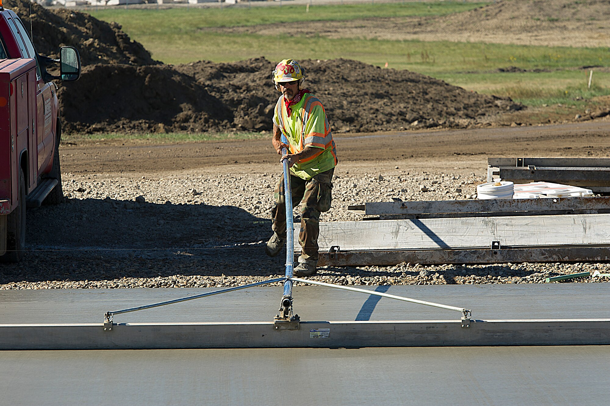 Contractors, in coordination with the U.S. Army Corps of Engineers, are working to complete a full-depth runway repair at Minot Air Force Base, N.D. The runway was constructed in 1957 and work is currently underway for its complete replacement. At the present moment construction workers are fixing the 29-End Keel Section project, which is phase two of a three-phased approach to completely replace the entire runway. (U.S. Air Force photo/Senior Airman Kristoffer Kaubisch)
