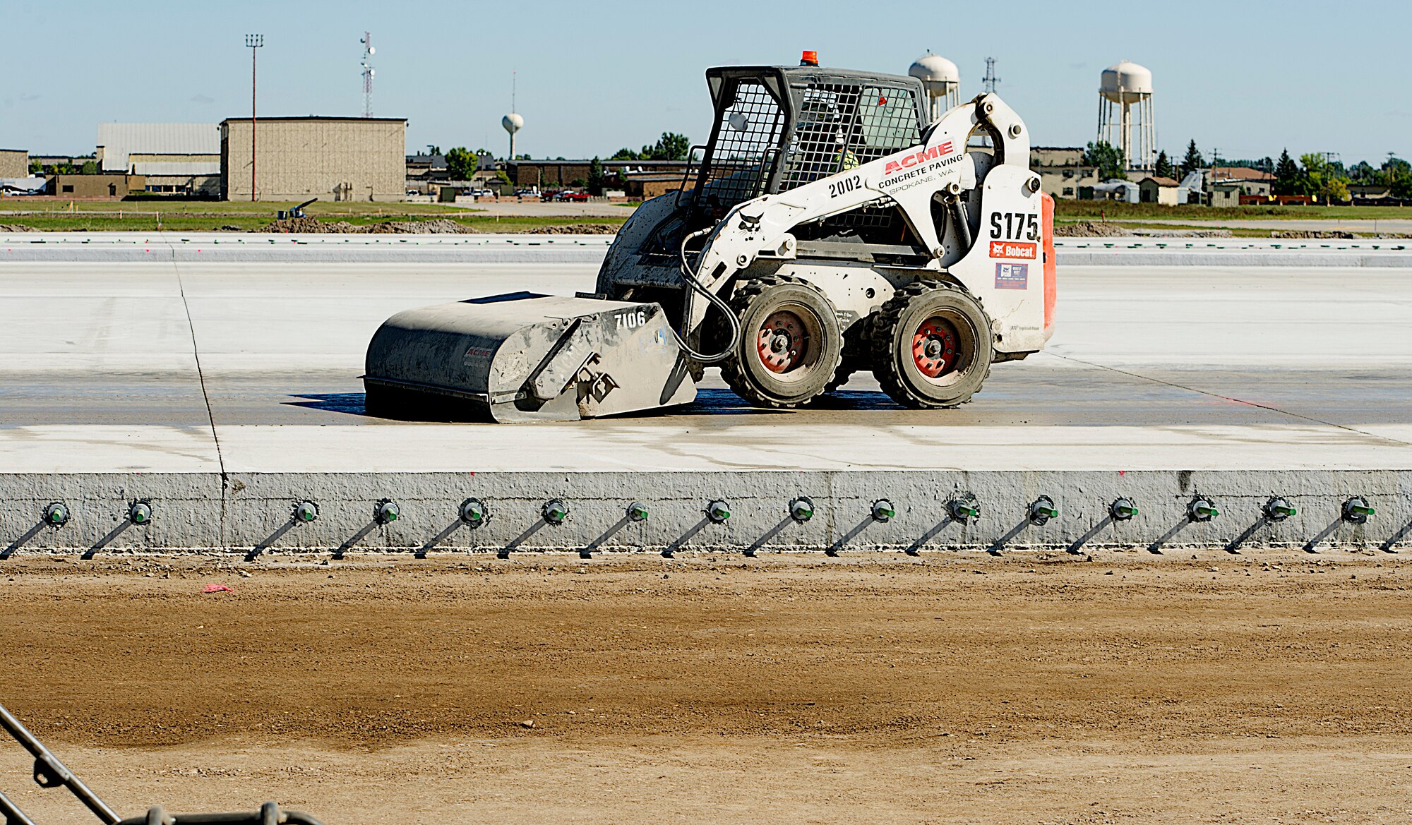 Contractors, in coordination with the U.S. Army Corps of Engineers, are working to complete a full-depth runway repair at Minot Air Force Base, N.D. The runway was constructed in 1957 and work is currently underway for its complete replacement. At the present moment construction workers are fixing the 29-End Keel Section project, which is phase two of a three-phased approach to completely replace the entire runway. (U.S. Air Force photo/Senior Airman Kristoffer Kaubisch)