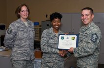Airman Bianca Mitchell, 5th Logistics Readiness Squadron personal property clerk, was presented with the Top 3 award for the month of September, Oct. 2. She scored a 96 percent on her career development courses’ final exam, after which she established a study program for two coworkers that allowed them to score within the 90th percentile. Among other accomplishments, her knowledge within her career field was amassed with her being chosen by the section chief to counsel all incoming and outgoing VIPs. (U.S. Air Force photo/Senior Airman Kristoffer Kaubisch)