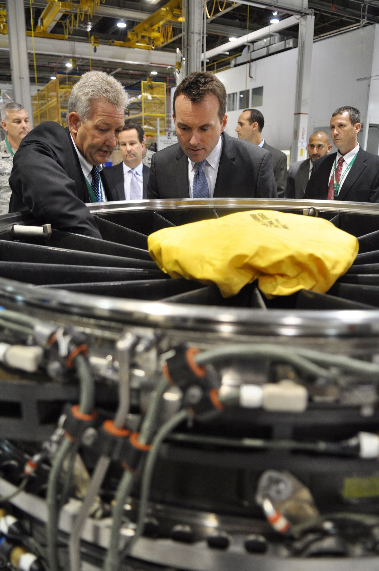 Michael Opela, 76th Propulsion Maintenance Group director, left, discusses
F135 engine maintenance with Acting Secretary of the Air Force Eric K.
Fanning at the Oklahoma City Air Logistics Complex. The F135 engine
maintenance line will support the F-35 Joint Strike Fighter.  Secretary
Fanning's visit to Tinker Sept. 27 was his first depot visit as acting
secretary. (Air Force photo by Micah Garbarino)

