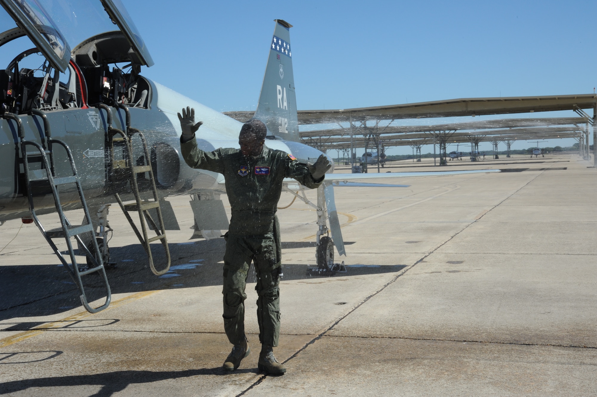 Gen. Edward A. Rice Jr., commander of Air Education and Training Command, completed his final Air Force flight Oct. 7, in a T-38 Talon at Joint Base San Antonio-Randolph, Texas. The general retired Oct. 10 after more than 35 years of Air Force service and 4,000 flying hours. As is customary with a "fini flight," at the end of the sortie he was greeted by friends and acquaintances and doused with water hoses. (U.S. Air Force photo by Rich McFadden)
