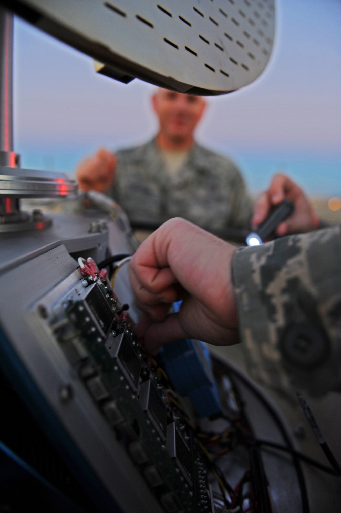 A connection inside the Portable Doppler Radar is tested during troubleshooting Oct. 10, 2013, at Incirlik Air Base, Turkey. The weather radar is used for detecting weather for alerts to both residents of Incirlik AB and the three million residents of the city of Adana, Turkey. (U.S. Air Force photo/Senior Airman Chase Hedrick)