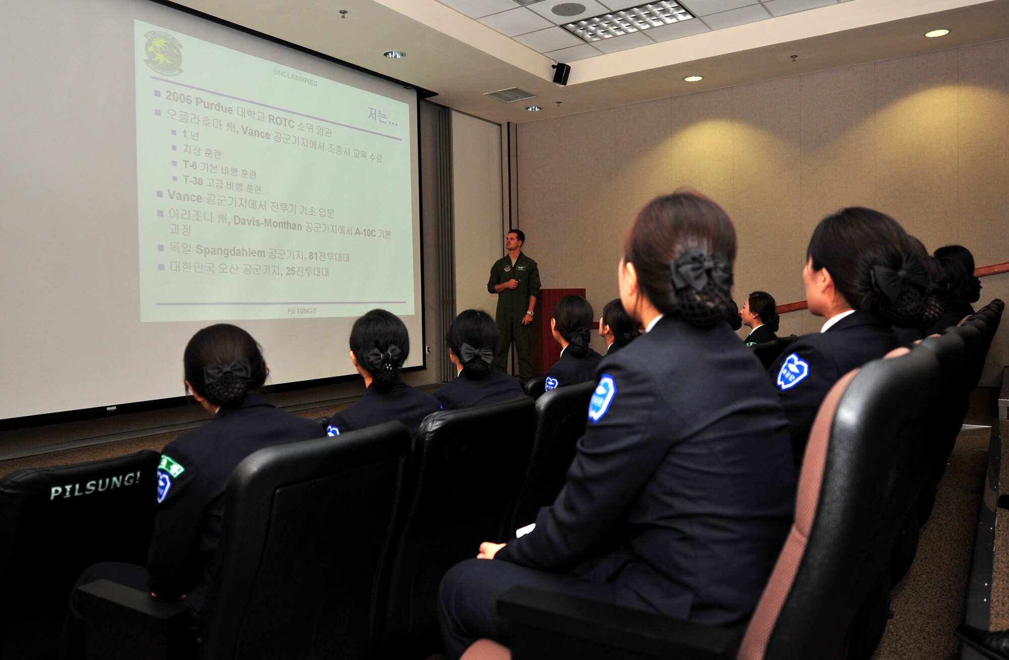 Capt. Michael Dumas, 25th Fighter Squadron A-10 Thunderbolt pilot, briefs Republic of Korea army Reserve Officers' Training Corps cadets from Sungshin University during a tour of Osan Air Base, ROK, Oct. 9, 2013. Dumas, along with 1st Lt. Clancy Morrical, 36th Fighter Squadron F-16 Fighting Falcon pilot, gave nearly 60 cadets a glimpse into what it’s like to be an officer and a fighter pilot in the U. S. Air Force. (U.S. Air Force photo/Airman 1st Class Ashley J. Thum)