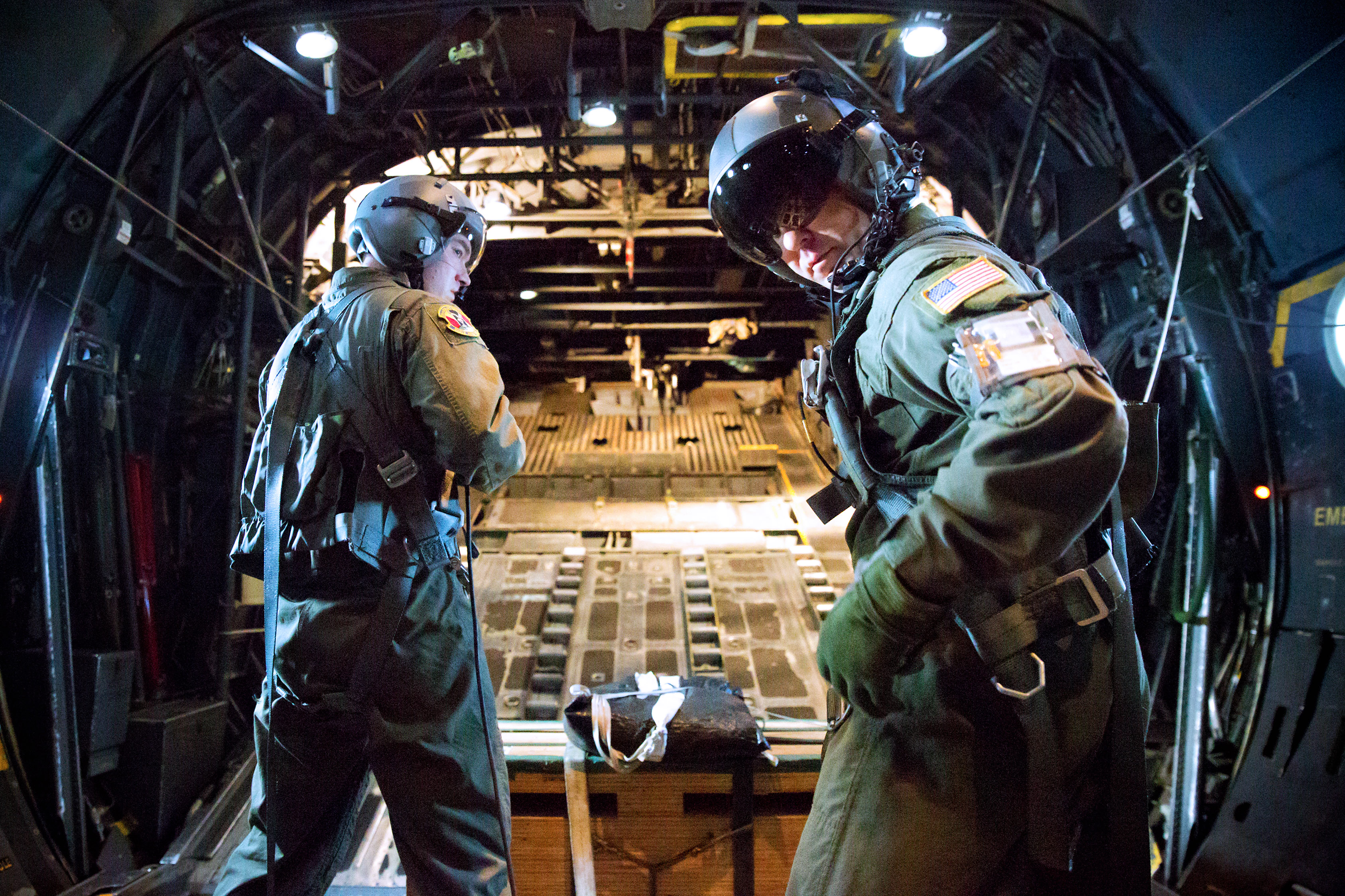 U.S. Air Force Airman 1st Class Andrew Fox, left, and U.S.