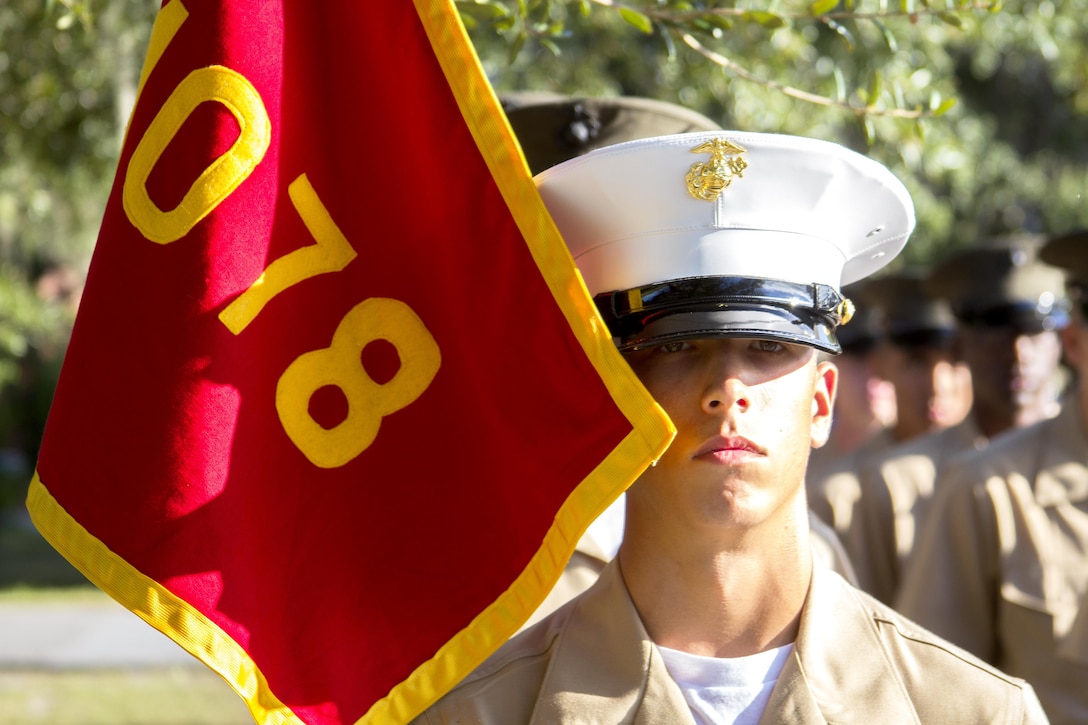 Pfc. Kendall James, honor graduate for platoon 1078, stands at attention before graduation aboard Parris Island, S.C., Oct. 11, 2013. James, native of Gautier, Miss., was recruited by Sgt. Johan Nisbett, recruiter from Recruiting Substation Gulfport, Recruiting Station Baton Rouge, will be able to enjoy some much deserved leave with his family as he prepares for Marine Combat Training in Camp Geiger, N.C. (U.S. Marine Corps photo by Lance Cpl. John-Paul Imbody)