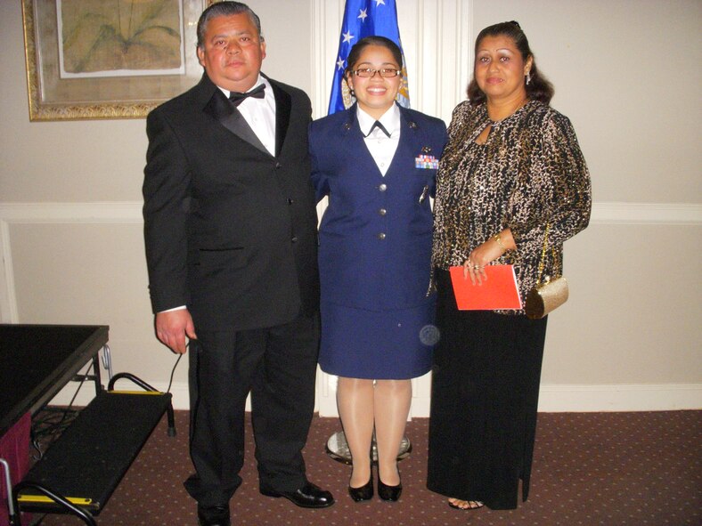 U.S. Air Force Staff Sgt. Erika Osorio, 7th Medical Group, poses for a photo with her parents at her Airman Leadership School graduation. Osorio joined the Air Force initially to pay for her college, but after graduating basic training she learned her purpose was much more than that, she had joined to serve. (Courtesy Photo)