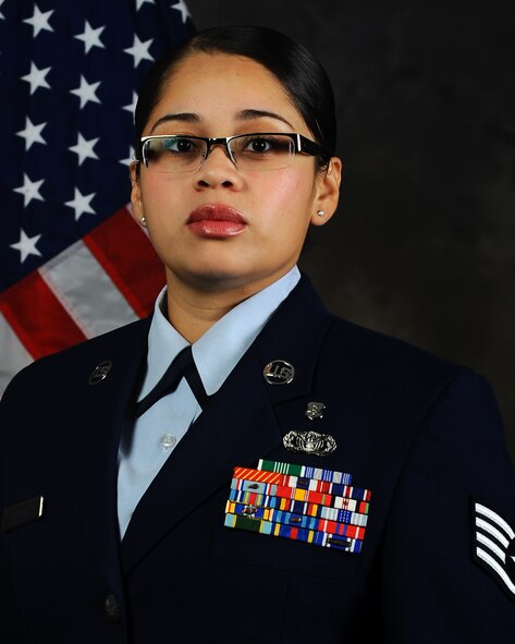 U.S. Air Force Staff Sgt. Erika Osorio poses for an official photo at Dyess Air Force Base, Texas, Sept. 13, 2013. Osorio is an instructor at the 7th Medical group education and training office. Her family migrated to the U.S. from El Salvador during the Salvadoran Civil War to seek out a better life. (U.S. Air Force photo by Airman 1st Class Alexander Guerrero/Released)