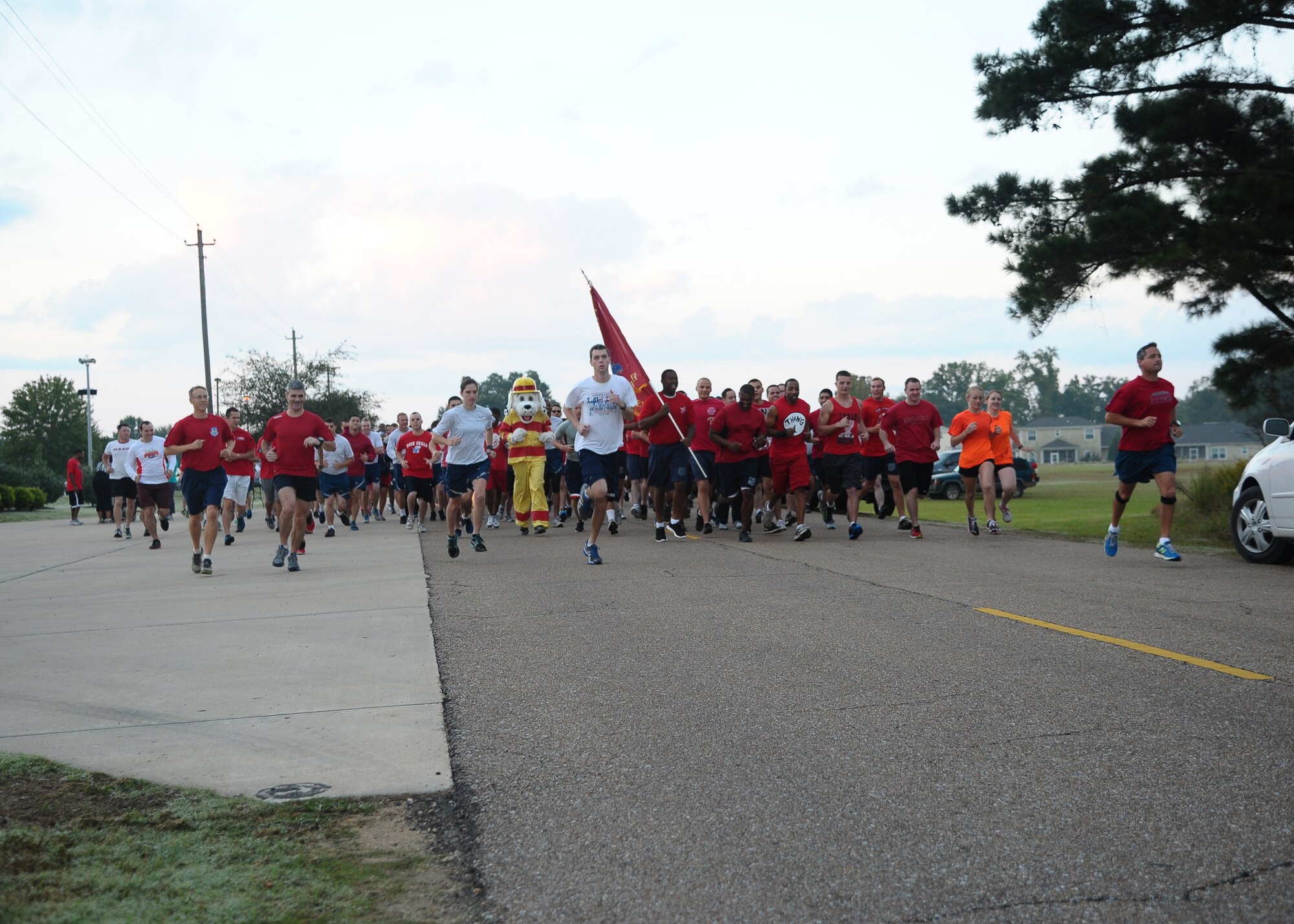 In a sea of red, participants of the Fire Prevention Week 5k ran down Independence Ave. Friday, Oct. 11. This year’s theme for Fire Prevention Week was “Preventing kitchen fires”. The Fire Department hosted many events for the week to include a parade through base housing, a Fire Department Open House, a Base Fire Muster Competition and lastly, the 5k Fire Prevention Run. 
