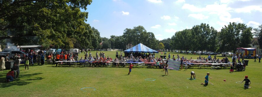 Members of Team Barksdale and the local community enjoy food and camaraderie during Celebrate Barksdale on Barksdale Air Force Base, La., Oct. 11, 2013. The annual event, hosted by the Shreveport-Bossier Military Affairs council, gives the local community a chance to show their appreciation for the military. (U.S. Air Force photo/Senior Airman Sean Martin)