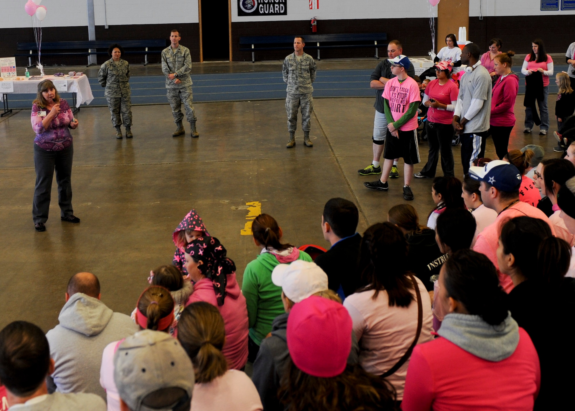 Patty Kussman, Rapid City Regional Hospital breast cancer navigator, speaks about cancer prevention during a breast cancer awareness event in the Pride Hangar at Ellsworth Air Force Base, S.D., Oct. 3, 2013. Breast Cancer Awareness Month is an international health campaign organized every October to increase awareness of the disease and raise funds for research and support for victims. (U.S. Air Force photo by Senior Airman Anania Tekurio/Released)
