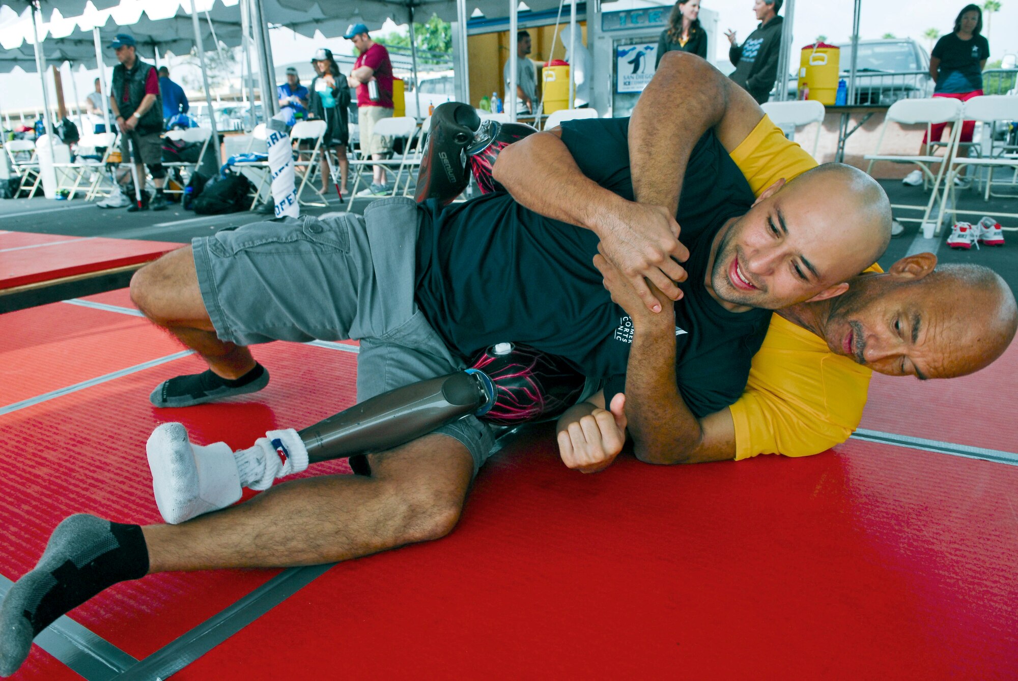 Retired Army Specialist Malcolm Pointer puts retired Army Staff Sgt. Jaime Luevanos in a hold while practicing judo Sept. 18 at the Chula Vista Olympic Training Center.(U.S. Air Force photo/Senior Airman David Owsianka)