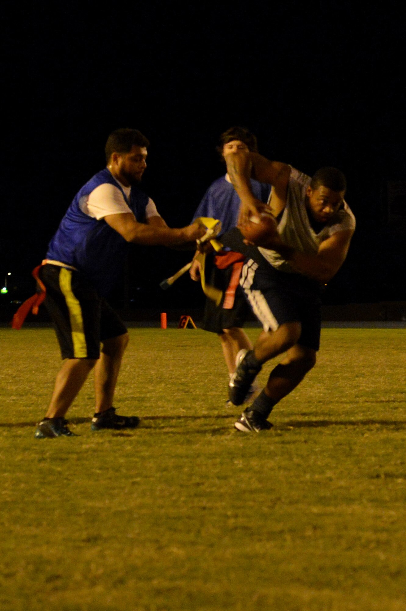 Harold Cade, 56th Communications Squadron, runs the ball for the end zone during a flag football game with Navy Oct. 2 at Luke Air Force Base. The Navy dominated 56th CS with a score of 24-6. (U.S. Air Force photo/Airman 1st Class James Hensley)