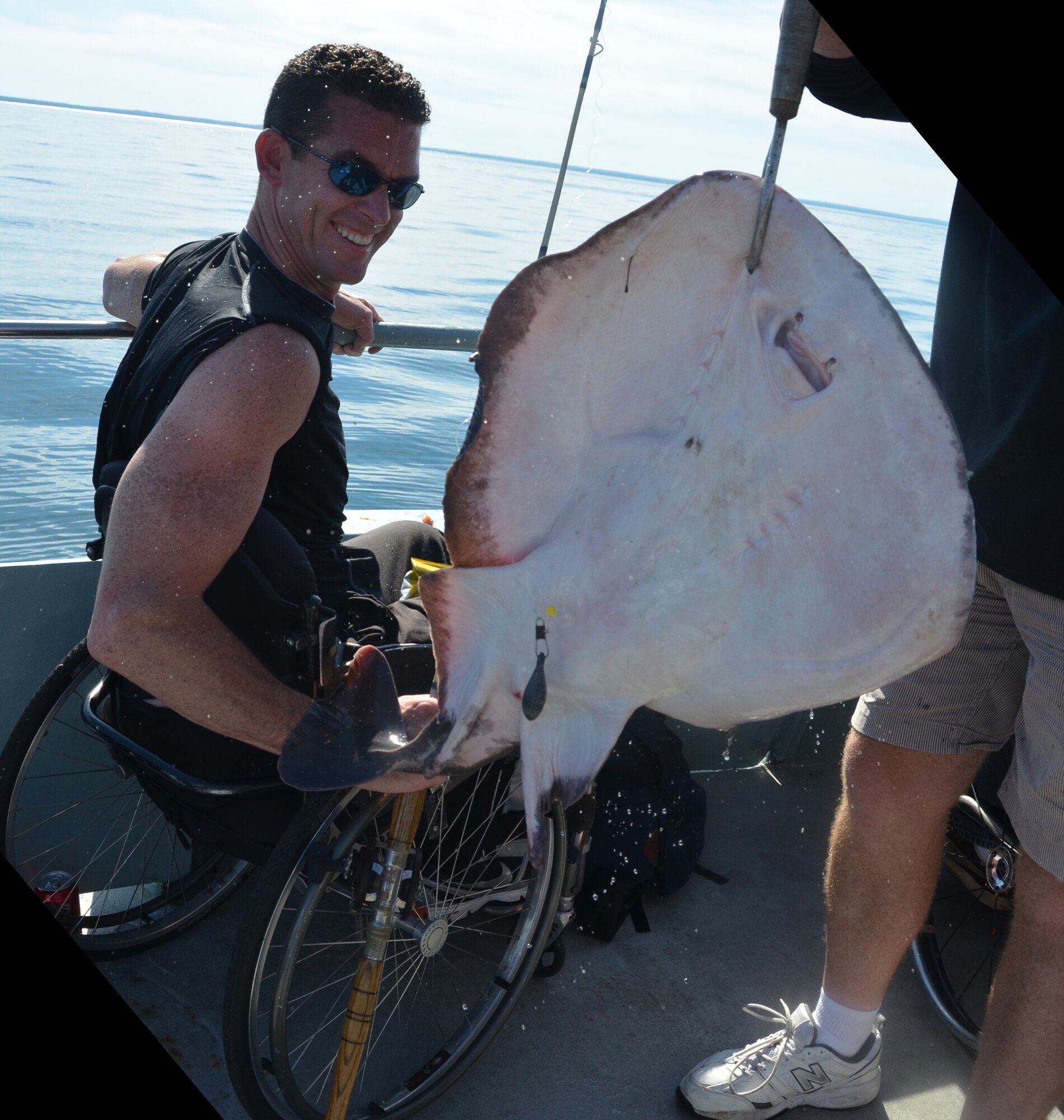 On Sept. 16, Lt. Col. Charles “Chip” Carroll hosted 27 wounded veterans aboard his fishing boat in Cape Cod. Lt. Col. Carroll been to more than 30 countries and has been involved in countless humanitarian and contingency responses and yet he manages to synch not only his Air Force and Family life but also his life as a boat Captain. (U.S. Air Force photo/SSgt. Kelly Galloway)