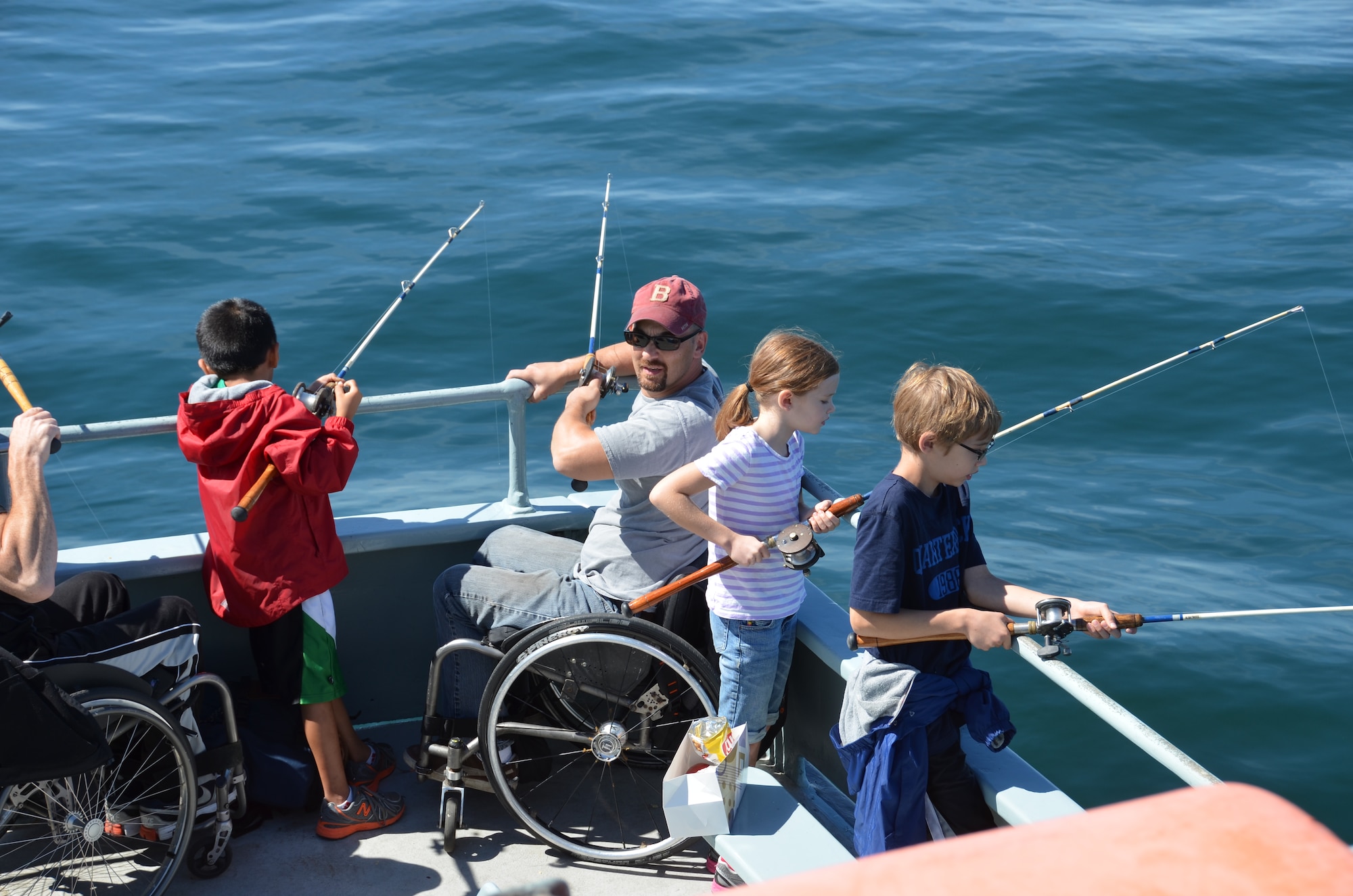 On Sept. 16, Lt. Col. Charles “Chip” Carroll hosted 27 wounded veterans aboard his fishing boat in Cape Cod. Lt. Col. Carroll been to more than 30 countries and has been involved in countless humanitarian and contingency responses and yet he manages to synch not only his Air Force and Family life but also his life as a boat Captain. (U.S. Air Force photo/SSgt. Kelly Galloway)