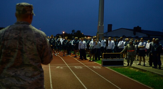SPANGDAHLEM AIR BASE, Germany–U.S. Air Force 1st Lt. Andrew Anderson, 52nd Civil Engineer Squadron base energy manager, from White Bear Lake, Minn., thanks sabers for participating in the Energy Action Month 5-K run Oct. 11, 2013. In celebration of Energy Action Month, in addition to the run, a booth will be hosted at the Base Exchange for hands-on training for people to learn about energy conservation Oct. 24. (U.S. Air Force photo by Staff Sgt. Christopher Ruano/Released)