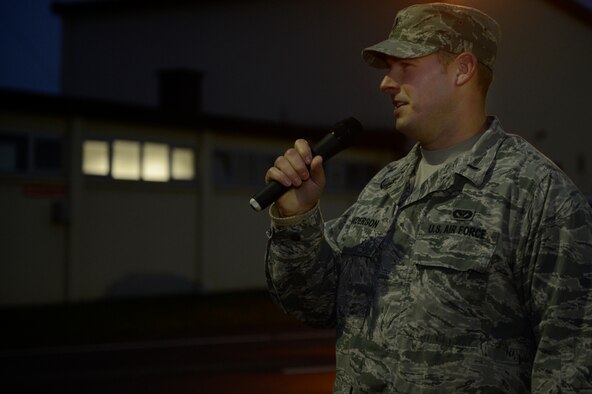 SPANGDAHLEM AIR BASE, Germany–U.S. Air Force 1st Lt. Andrew Anderson, 52nd Civil Engineer Squadron base energy manager, from White Bear Lake, Minn., greets Sabers to the Energy Action Month 5-K run Oct. 11, 2013. The Department of Energy is leading the national campaign by providing an opportunity for Airmen to learn more about the impact of energy on the Air Force's mission. (U.S. Air Force photo by Staff Sgt. Christopher Ruano/Released)