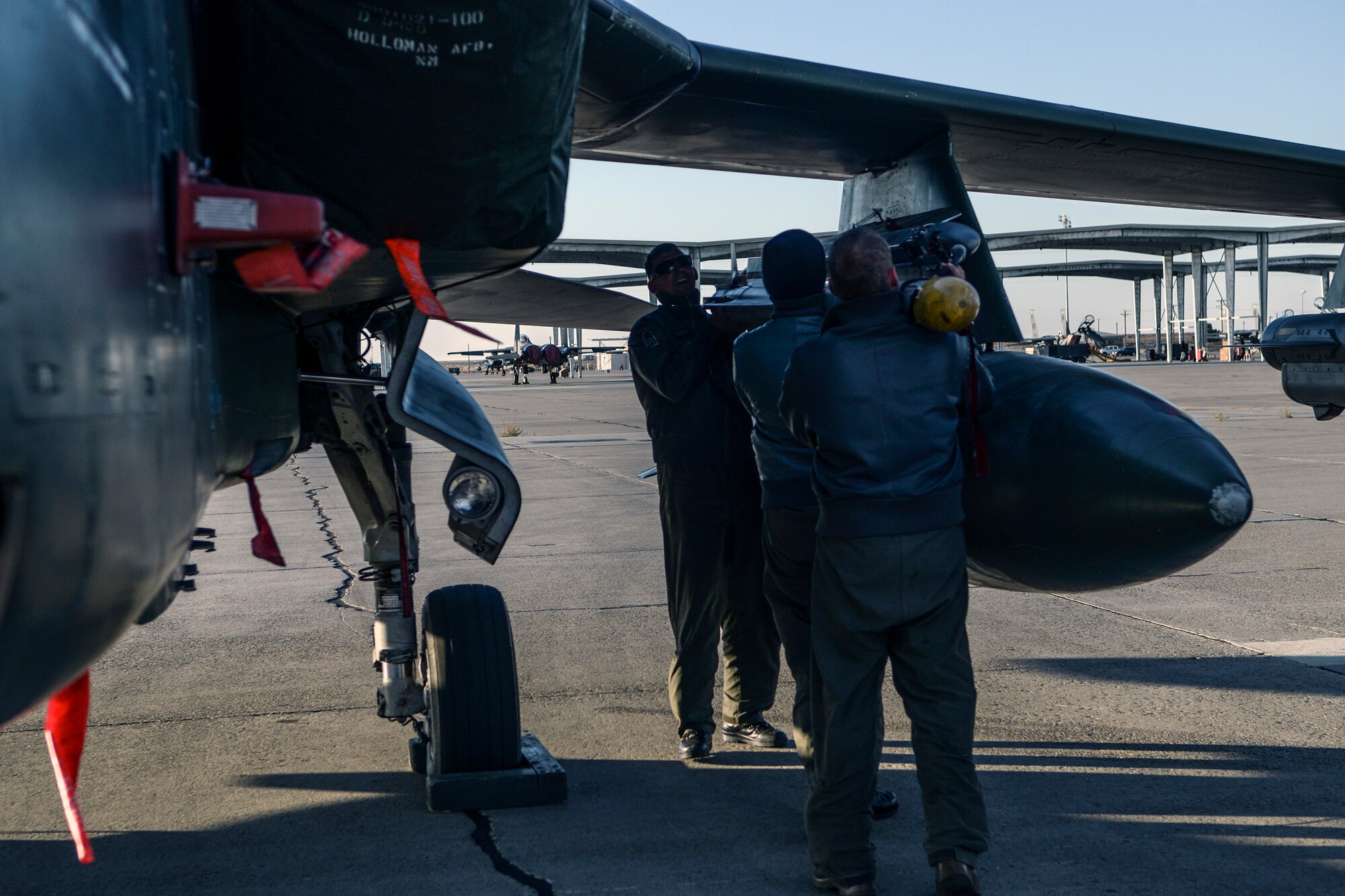 German Air Force crewchiefs and a weapons technician load exercise ordinance on an AG-51 Tornado at Mountain Home Air Force Base, Idaho, Oct. 10, 2013, during exercise Mountain Roundup 2013. More than 300 Germans and Canadians, and an equal number of U.S. Navy, Marine Corps, Army and Air Force are participating in ground operations, close-air support, urban combatives, convoy operations, basic fighter maneuvers, counter air and multiple air-to-air training scenarios. (U.S. Air Force photo by Master Sgt. Kevin Wallace)