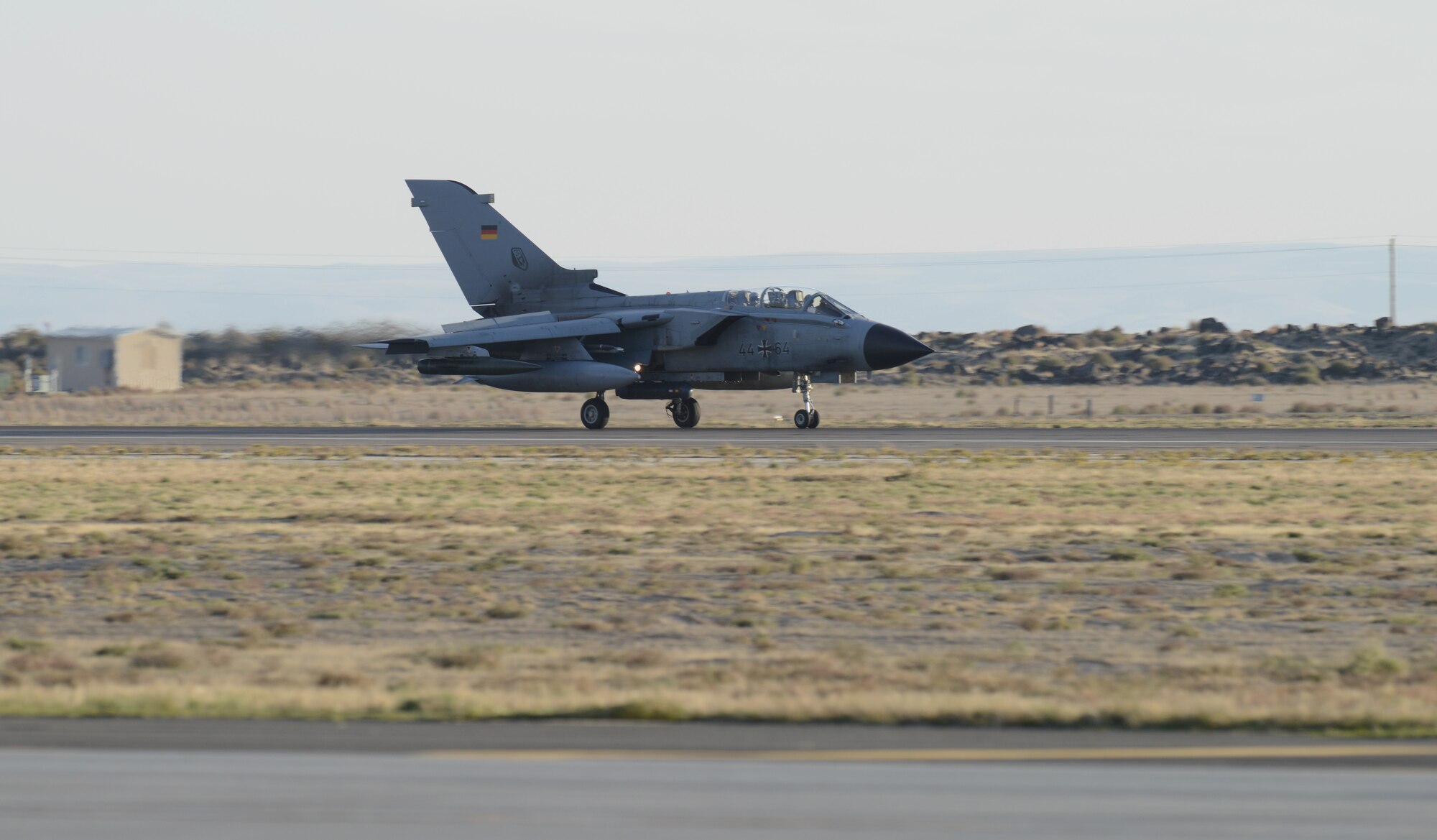 A German Air Force AG-51 Tornado lands at Mountain Home Air Force Base, Idaho, Oct. 10, 2013, during exercise Mountain Roundup 2013. The exercise is a multinational combined-joint exercise which is part of the German Air Force Tornado Fighter Weapons Instructor Course Mission Employment Phase, scheduled to end here Oct. 16. (U.S. Air Force photo by Senior Airman Benjamin Sutton/RELEASED)