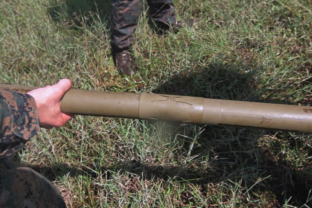 U.S. Marines couple together an M1A2 Bangalore torpedo while participating in Amphibious Landing Exercise 14 on Naval Station Leovigildo Gantioqui in San Antonio, Zambales province, Philippines, Oct. 3, 2013.