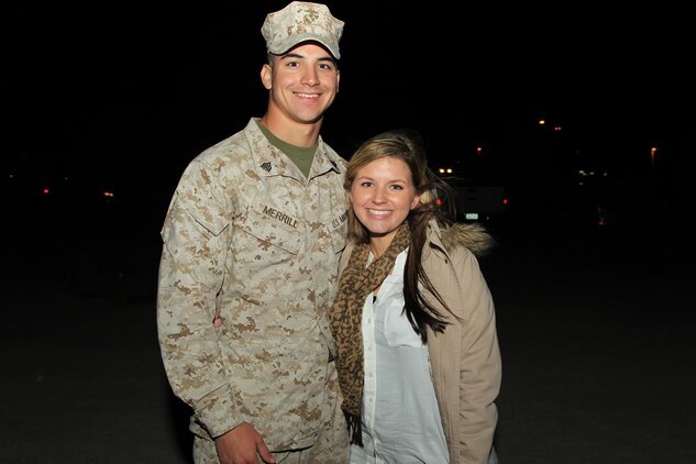 Sgt. Christopher Merrill, infantryman, L Co., 3rd Battalion, 4th Marines, reunites with his wife, Britnay, during a homecoming at Del Valle Field Oct. 9, 2013.
