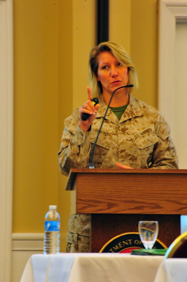 Chief Warrant Officer Dancy Simons, trial services administrative officer, gives a brief on legal policy at The Clubs at Quantico on Oct. 10, 2013. More than two-dozen service members attended the brief as a refresher course for current legal issues.